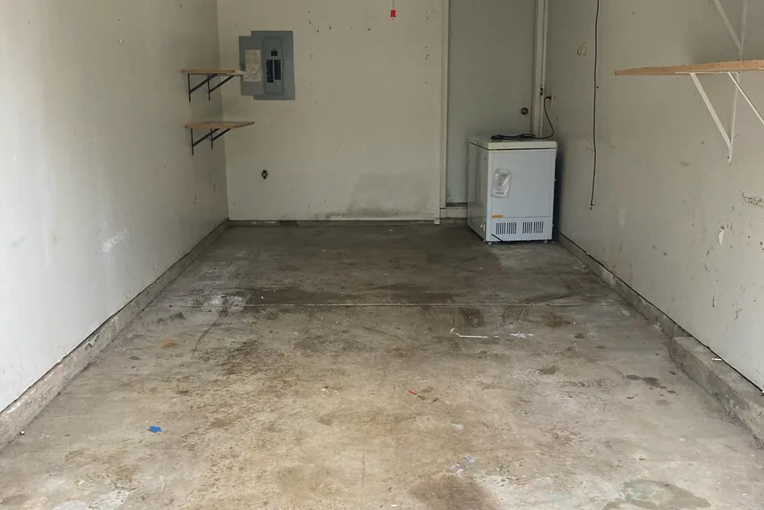 Empty cleared garage interior by ONIT Junk Removal