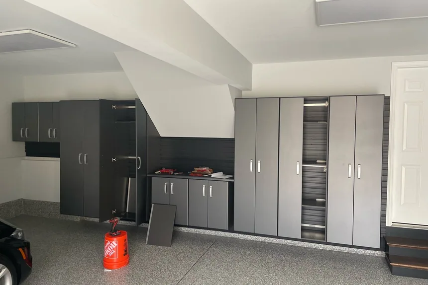 Organized garage with storage cabinets after a garage cleanout by ONIT Junk Removal