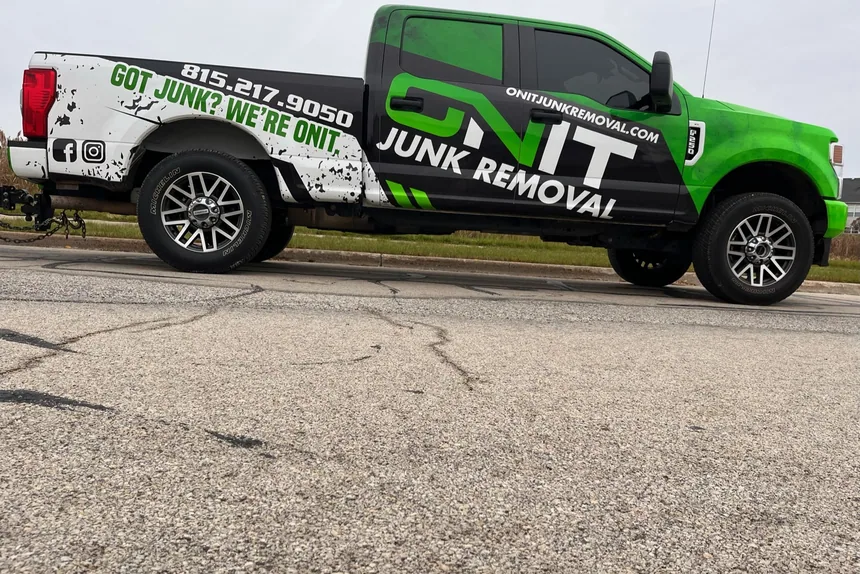 ONIT branded truck parked on road by ONIT Junk Removal