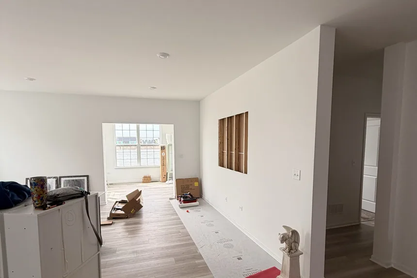 Empty hallway with leftover items before a property cleanout by ONIT Junk Removal