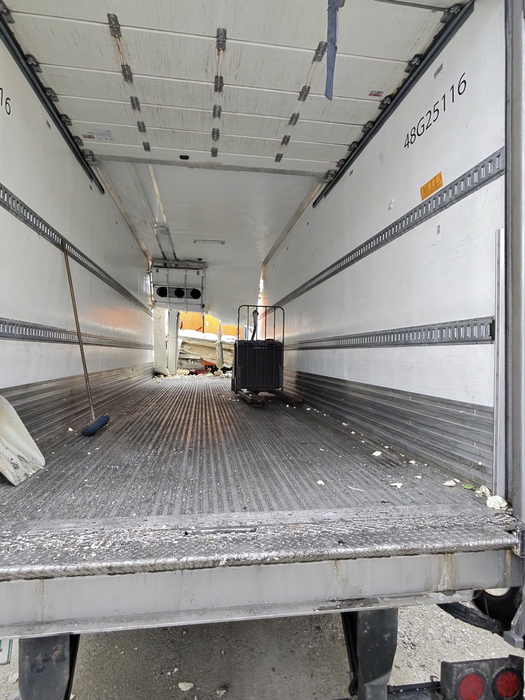 Same semi trailer after Onit Junk Removal cleared the freight and swept the floor